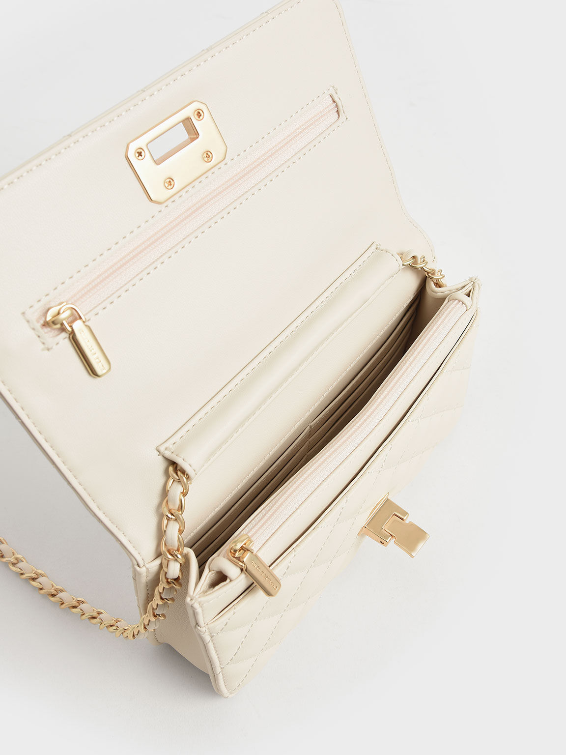 Cream Quilted Push-Lock Clutch - CHARLES & KEITH VN
