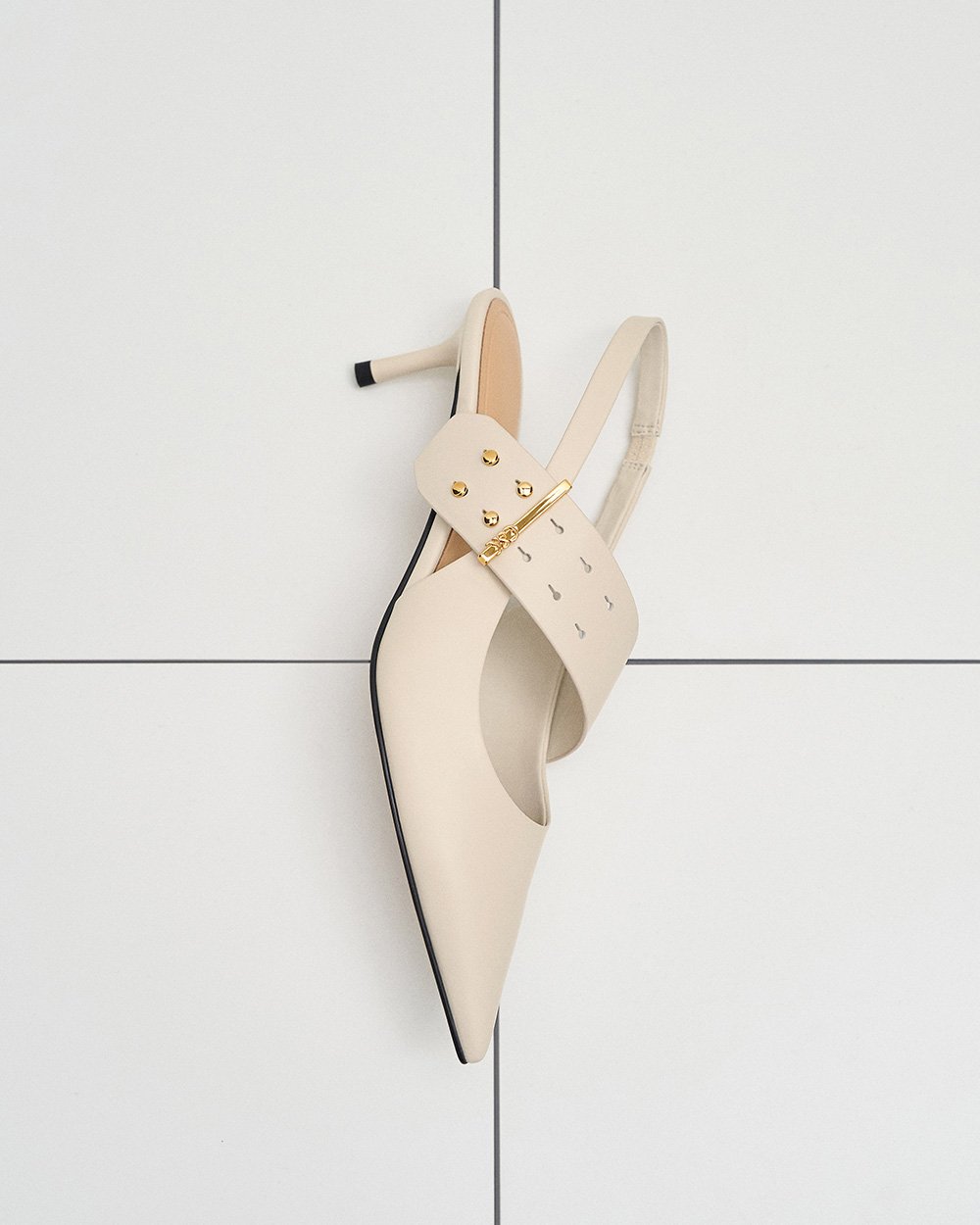 Women’s leather asymmetric-strap slingback Mary Jane pumps in white (close up) – CHARLES & KEITH